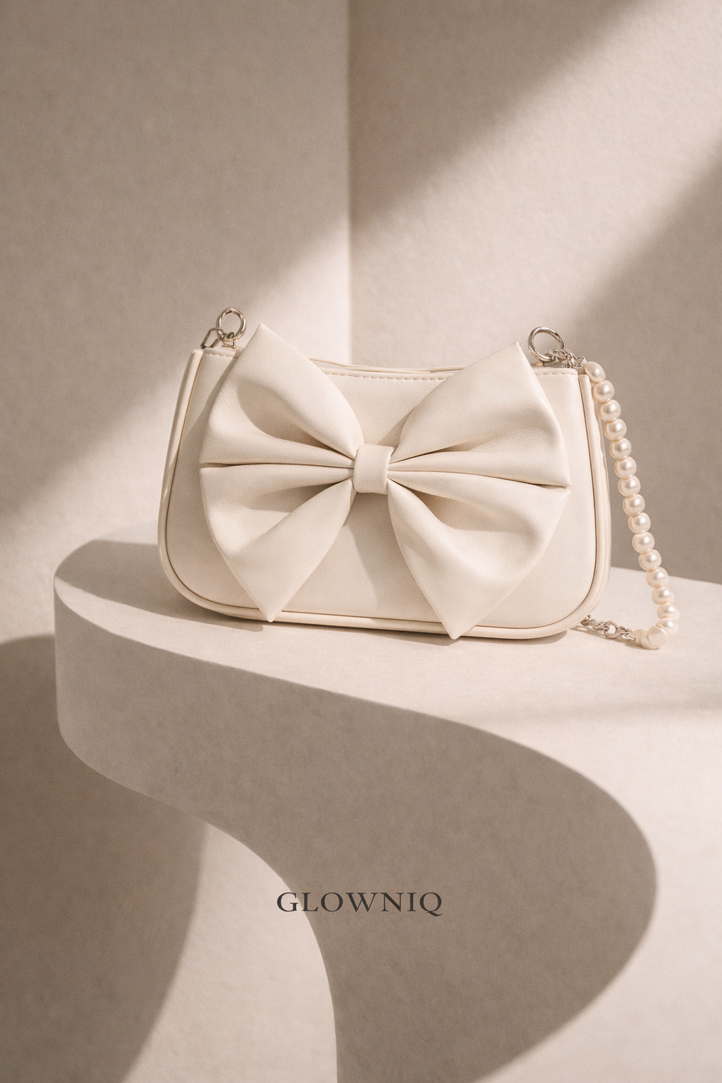 GLOWNIQ ÉLARA Schleifen-Handtasche